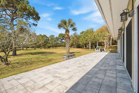 a view of a yard with an ocean view