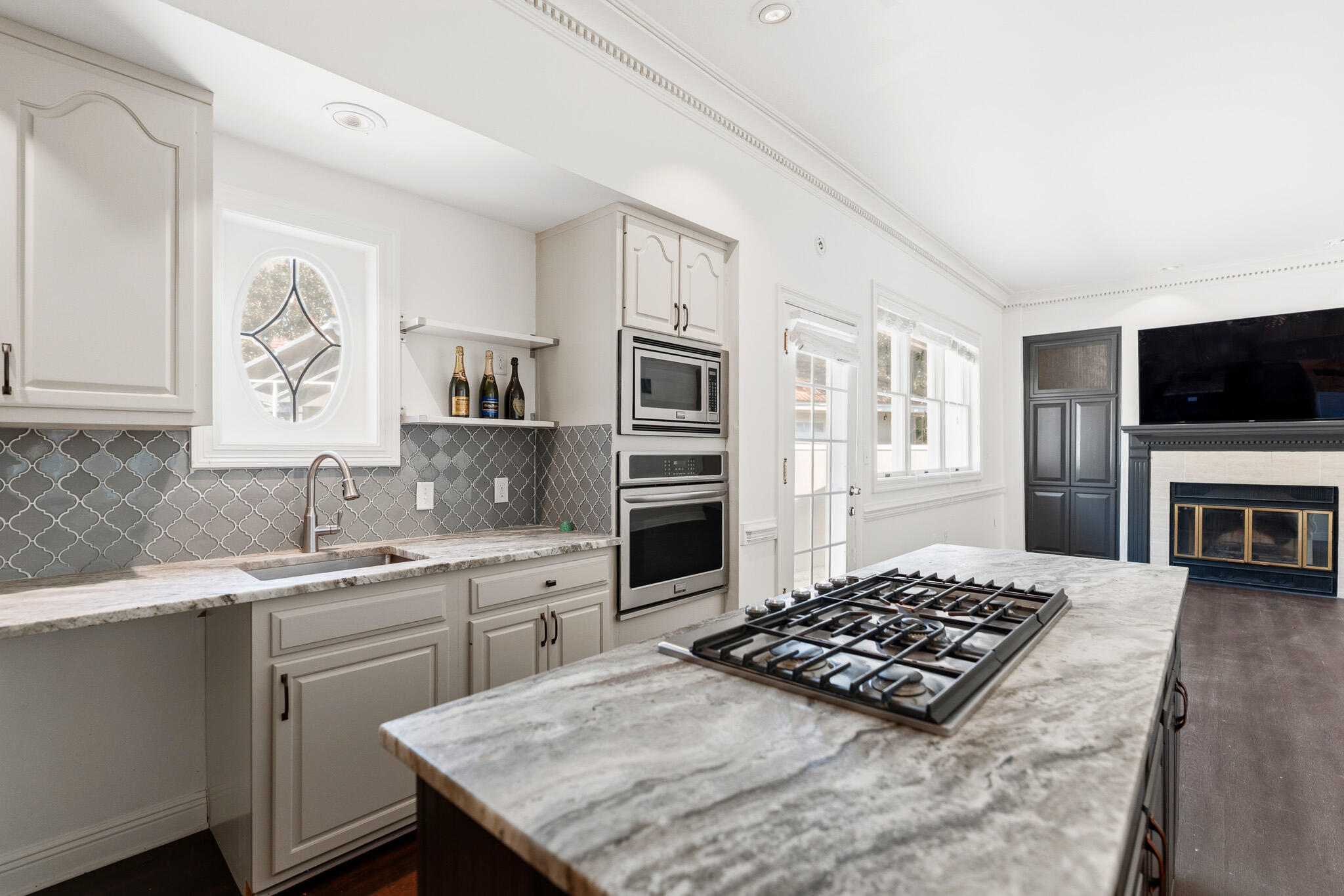 8 Weekewachee Circle Destin, FL 32541 - Photo 9 of 59 a kitchen with a stove a sink and a microwave