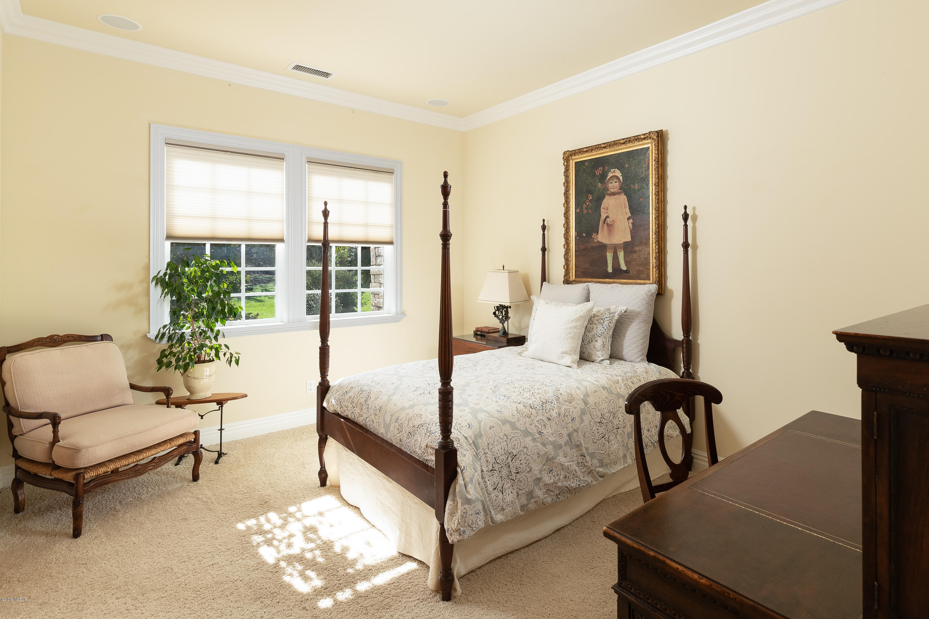 949 Old Ranch Road Solvang, CA 93463 - Photo 14 of 27 a bedroom with a bed and large window