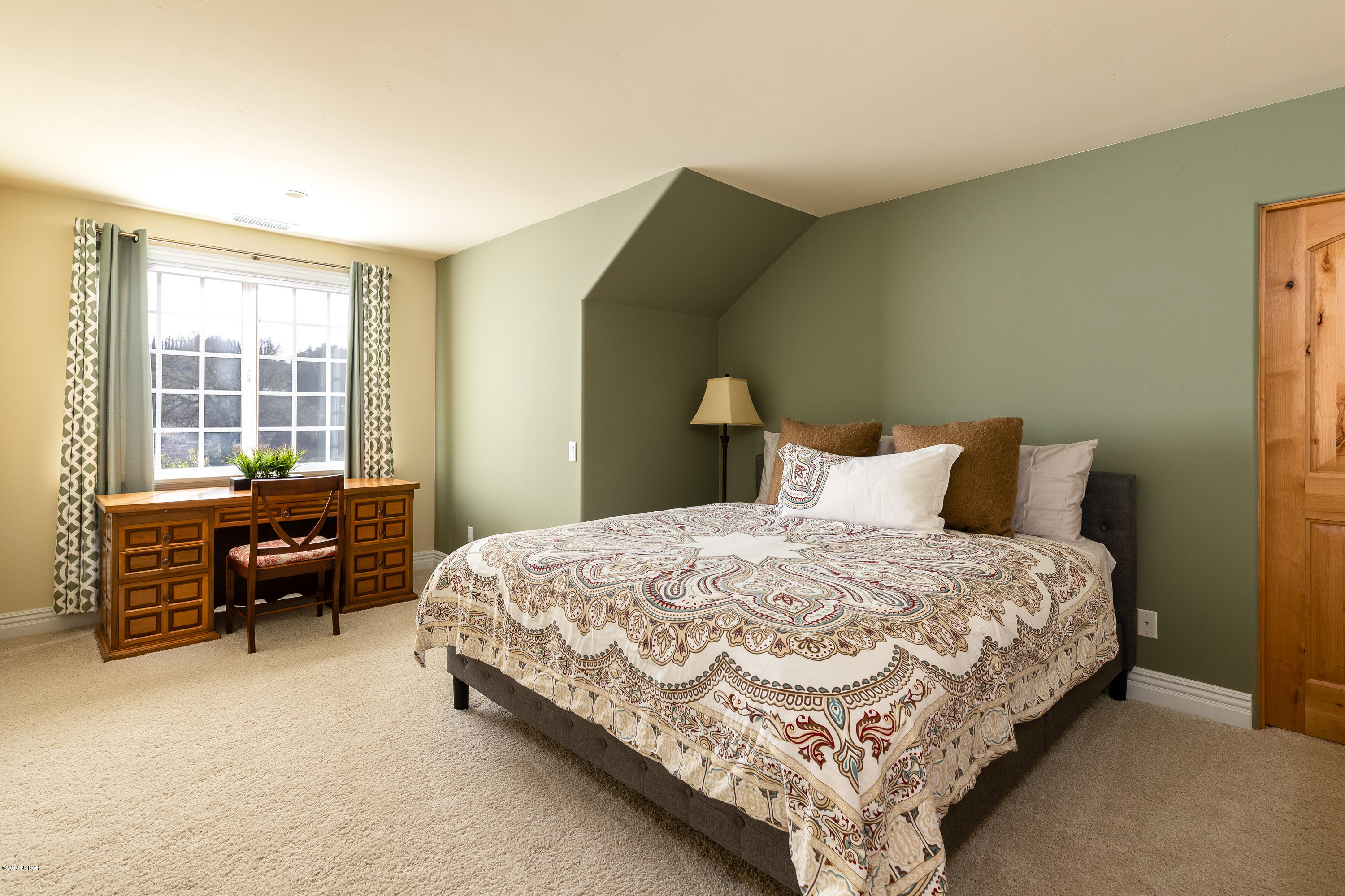 949 Old Ranch Road Solvang, CA 93463 - Photo 15 of 27 a bedroom with a bed and a couch