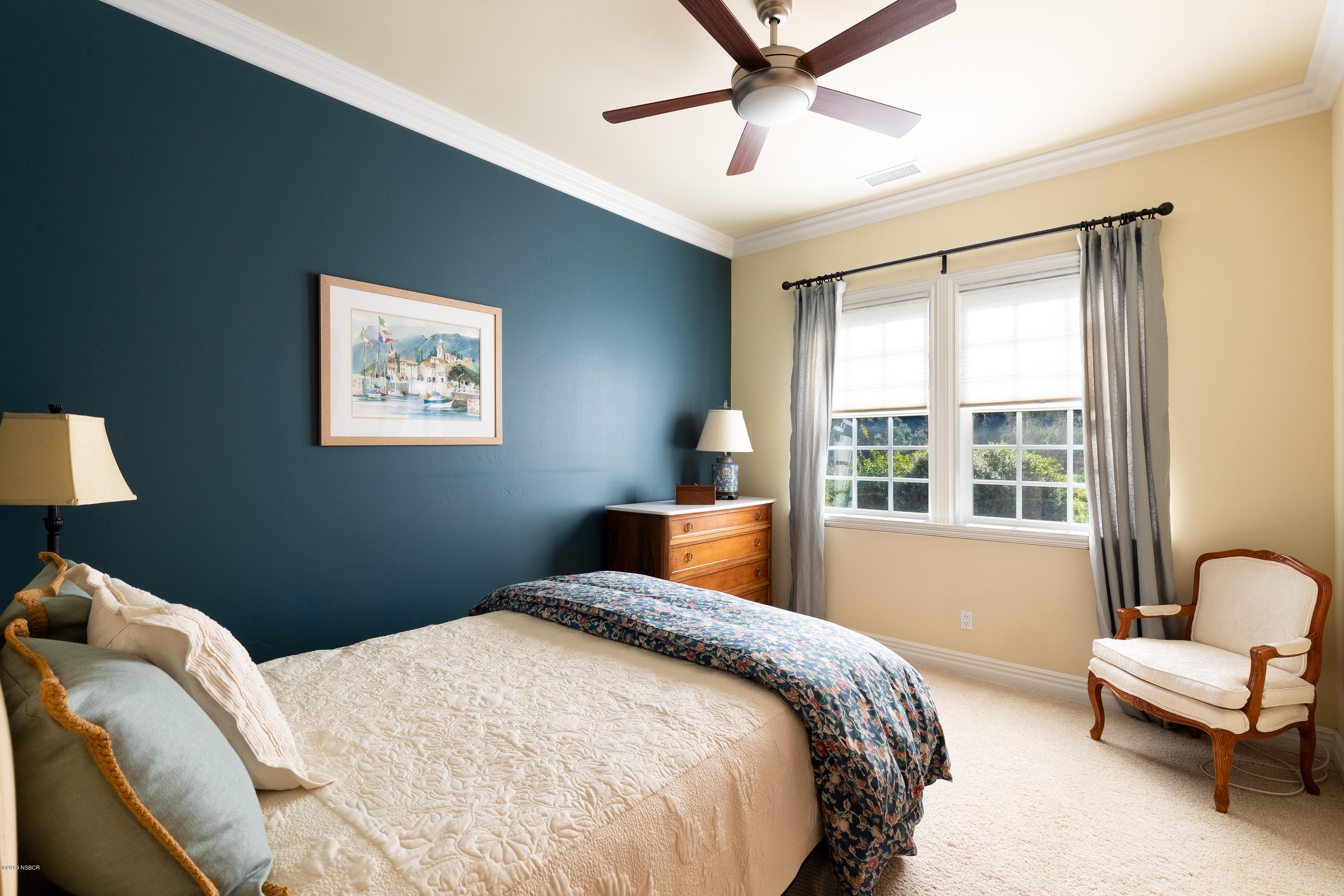 949 Old Ranch Road Solvang, CA 93463 - Photo 17 of 27 a bedroom with a bed and a large window