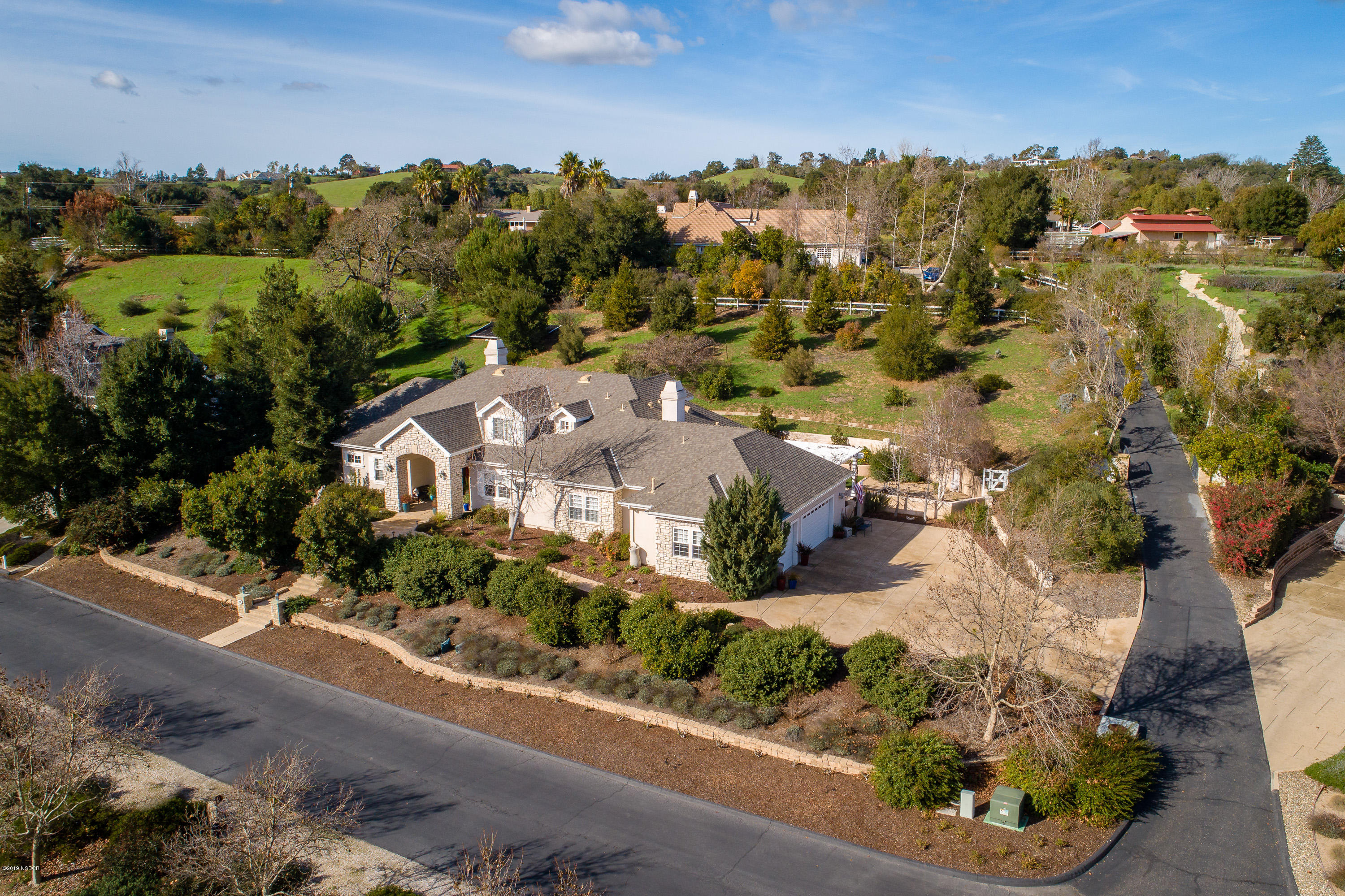 949 Old Ranch Road Solvang, CA 93463 - Photo 3 of 27 an aerial view of residential houses with outdoor space