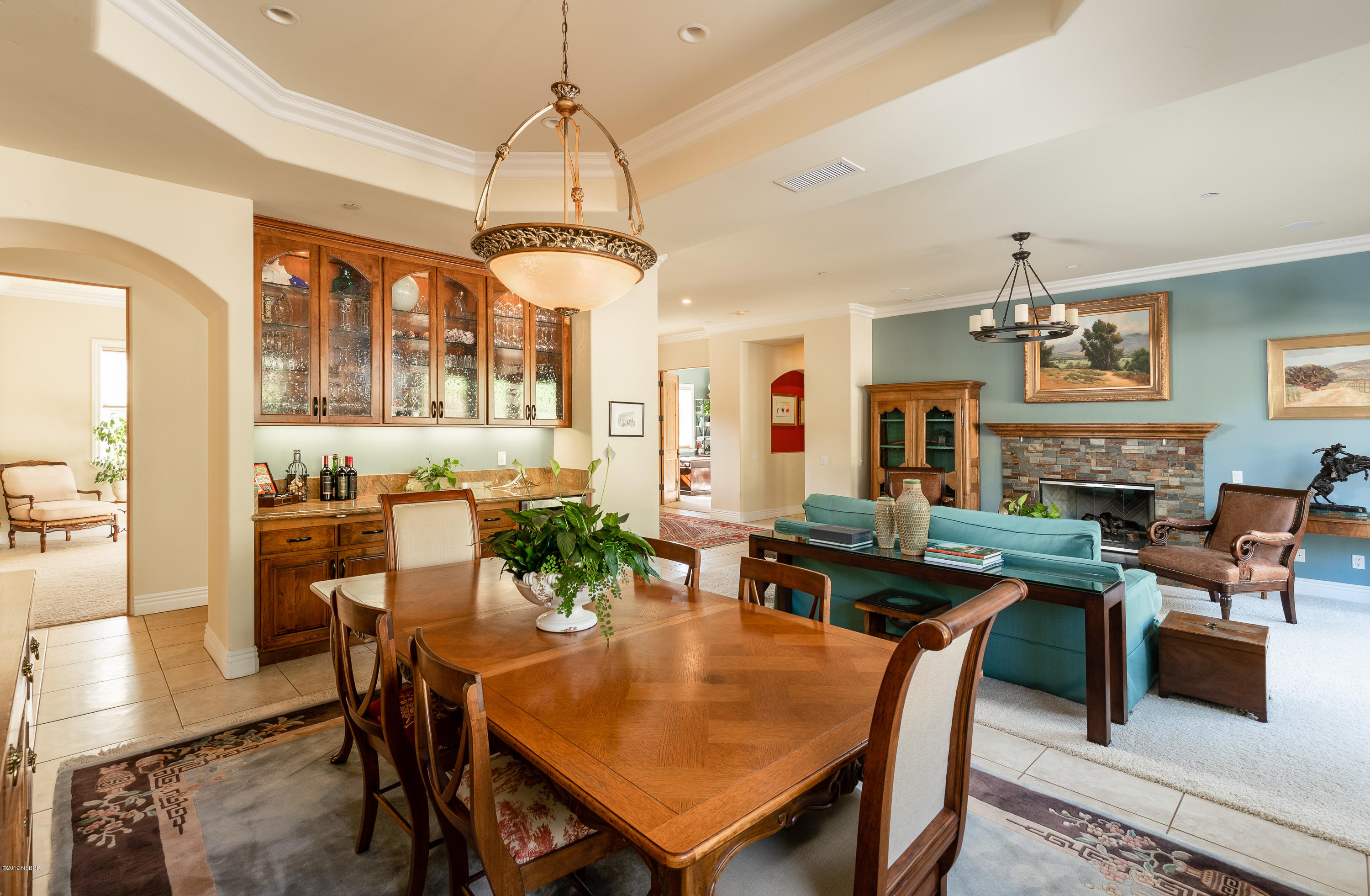 949 Old Ranch Road Solvang, CA 93463 - Photo 5 of 27 a view of a dining room with furniture window and wooden floor