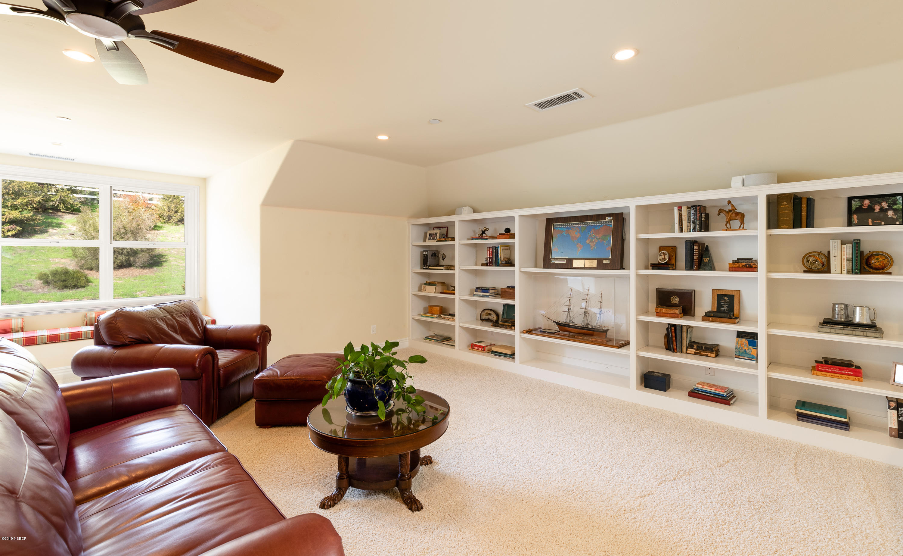 949 Old Ranch Road Solvang, CA 93463 - Photo 6 of 27 a living room with furniture and a potted plant