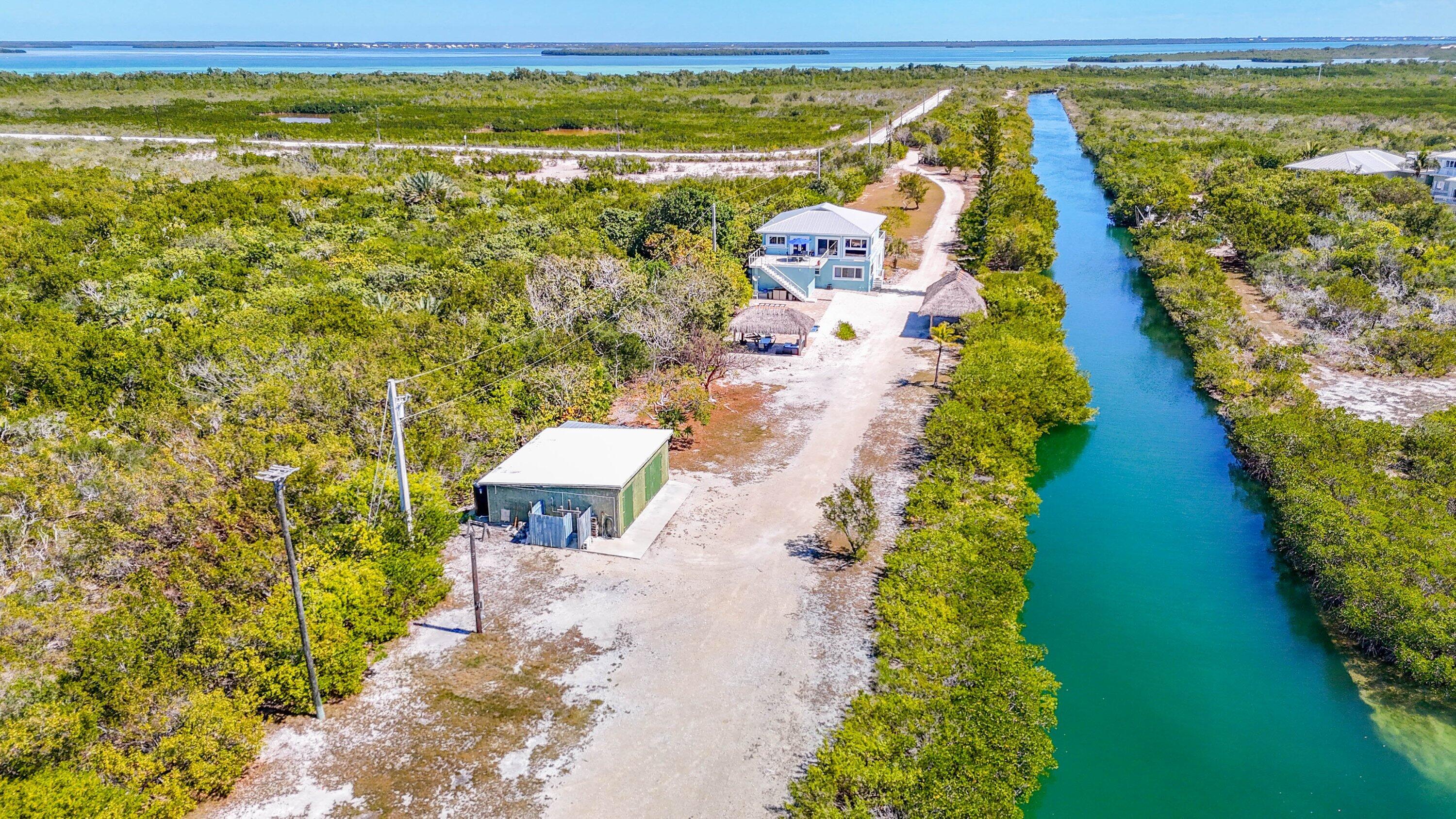4670 Dorn Road Summerland Key, FL 33042 - Photo 23 of 42 048-Canal and house