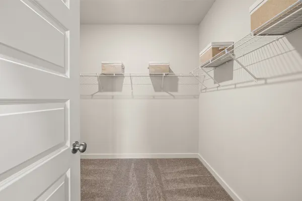 a en suite bathroom with double sink and shower