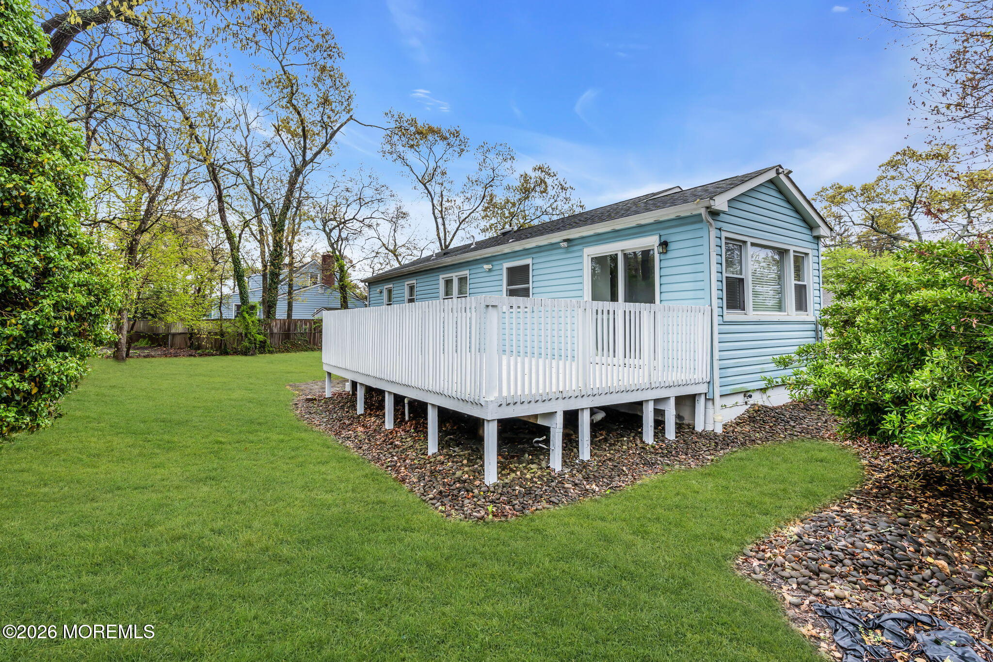 593 Beach Plum Road Brick, NJ 08723 - Photo 33 of 38 a view of a house with a backyard and a patio