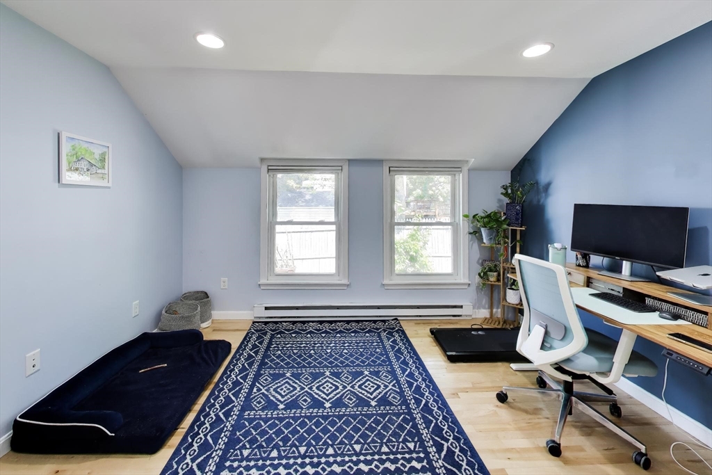 22 Douglas Road Ashland, MA 01721 - Photo 9 of 24 a view of a workspace with furniture and a window