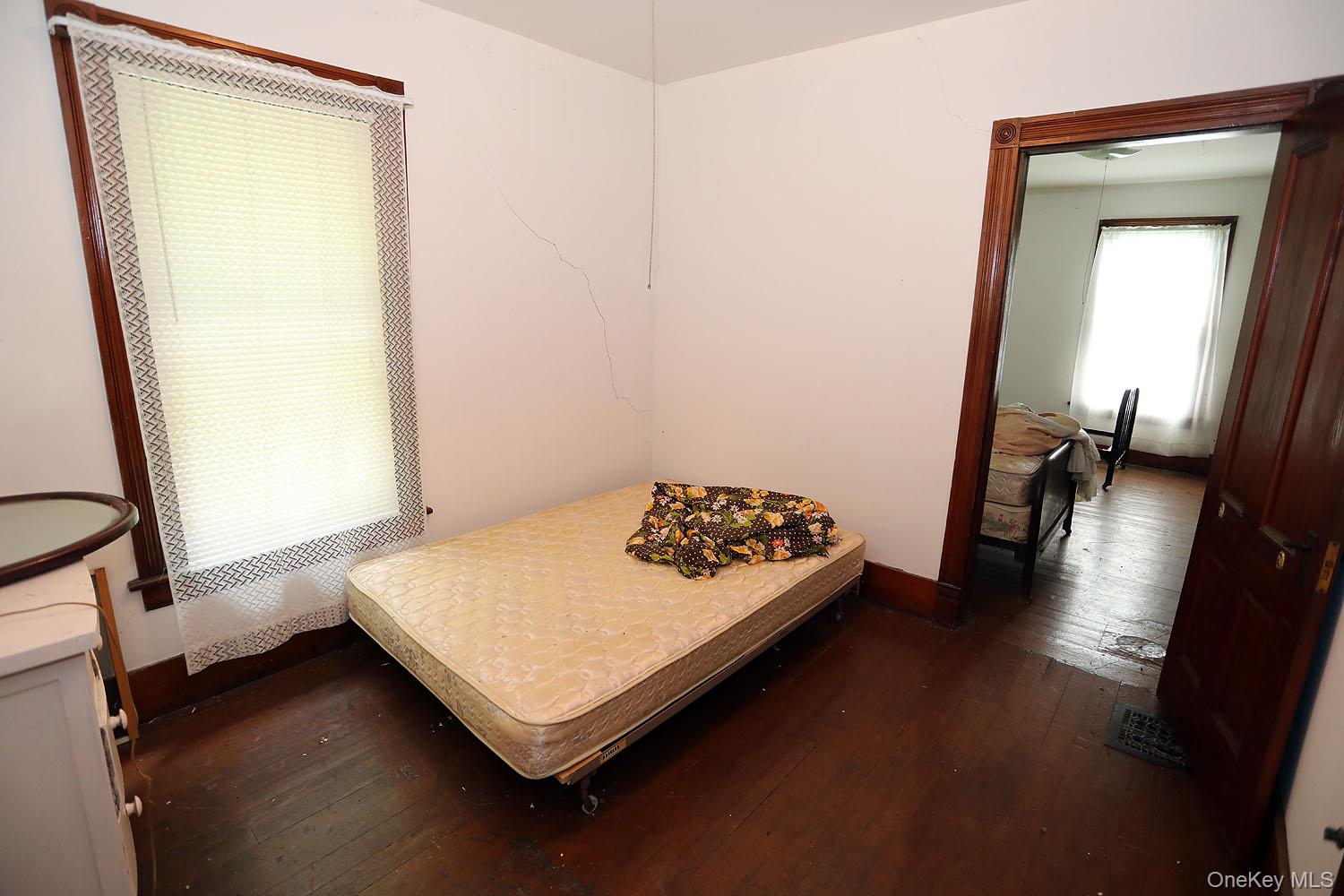 50 Parsonage Road Cochecton, NY 12726 - Photo 18 of 21 Bedroom with dark wood finished floors and baseboards