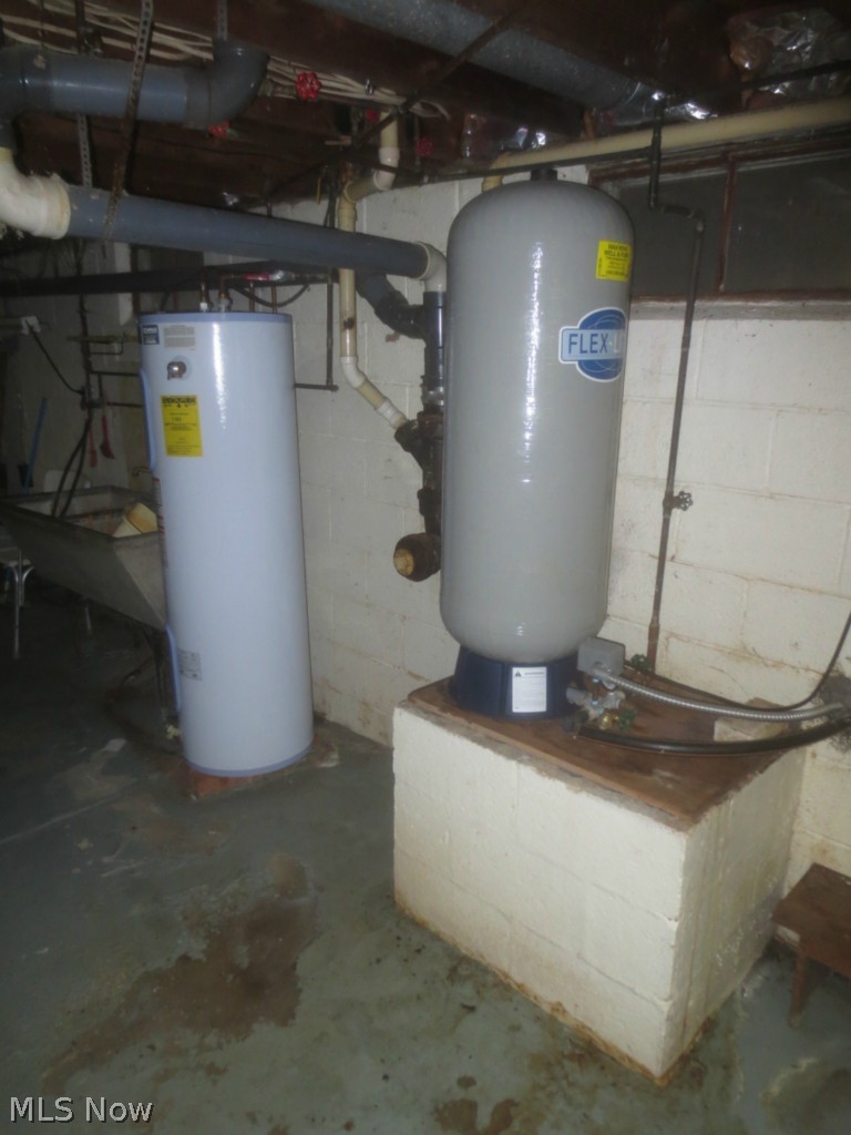 14355 Aquilla Road Burton, OH 44021 - Photo 19 of 22 View of new 40 gal electric water heater and well water expansion tank.