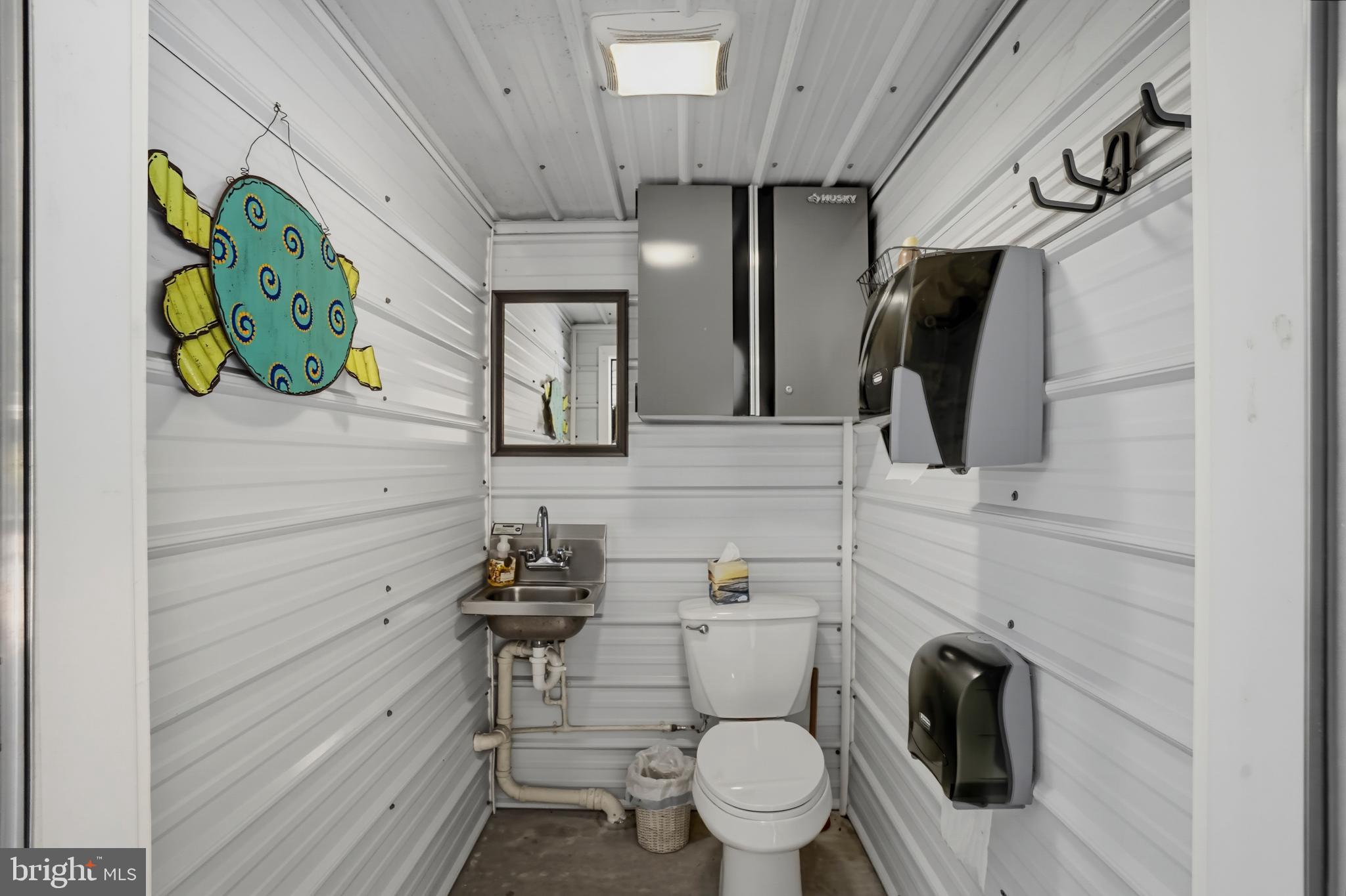 6893 Old Solomons Island Road Friendship, MD 20758 - Photo 9 of 58 Pool house bathroom