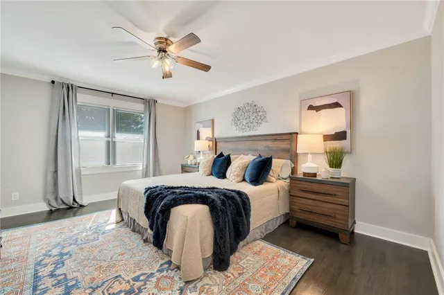 a bed room with a bed and a window