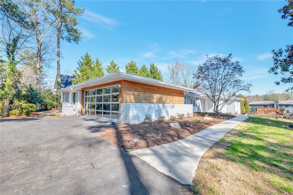 345 Pine Grove Road Roswell, GA 30075 - Photo 30 of 30 a view of a house with a yard