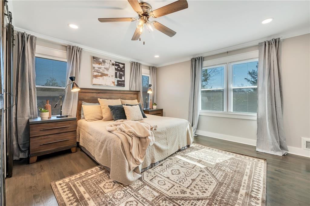 345 Pine Grove Road Roswell, GA 30075 - Photo 10 of 30 a bedroom with a large bed and a window