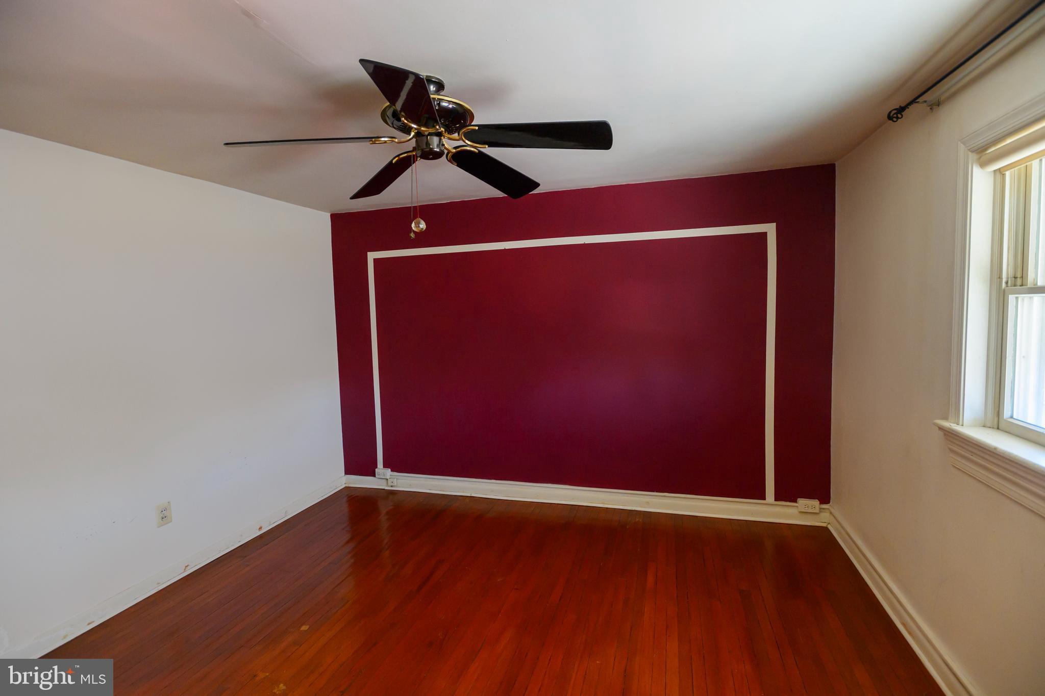 127 Sherbrook Boulevard Upper Darby, PA 19082 - Photo 12 of 24 a view of room with hardwood floor and window