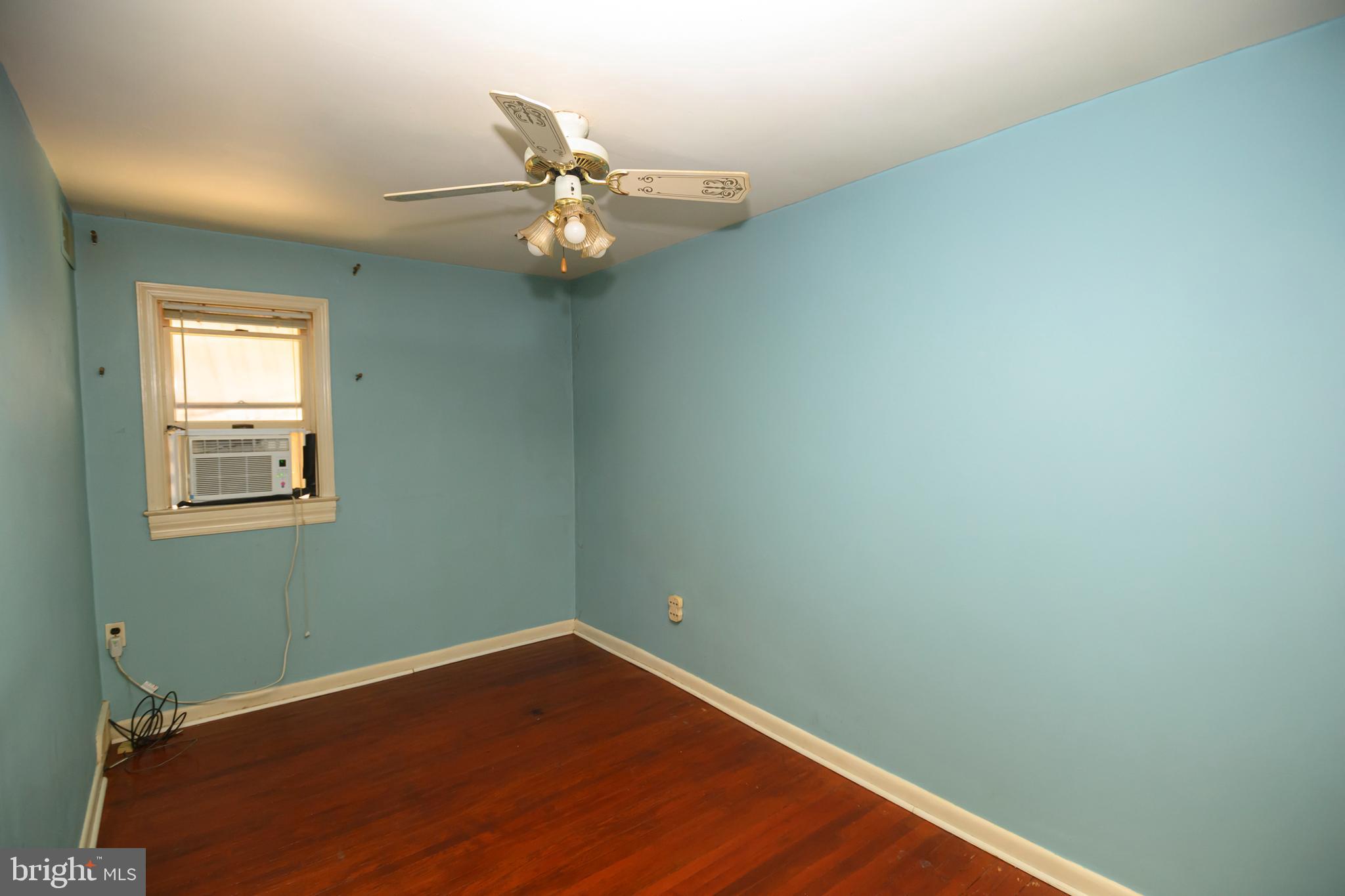 127 Sherbrook Boulevard Upper Darby, PA 19082 - Photo 13 of 24 an empty room with a window and ceiling fan
