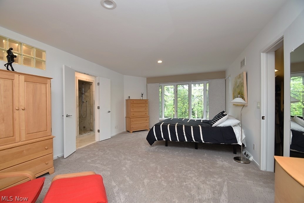 12632 Cedar Road Cleveland Heights, OH 44106 - Photo 15 of 29 Master suite that includes a large walk-in 9'x9' closet, full bath with steam shower and double sinks, 6'x6' laundry room and a sitting room that opens to second floor deck.