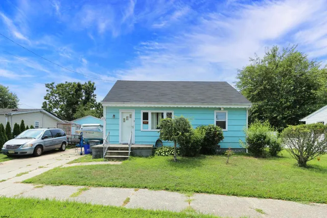 a view of a house with a garden