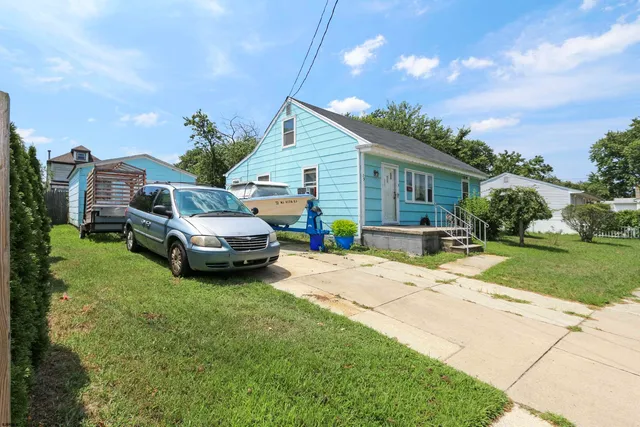 a house view with a garden space