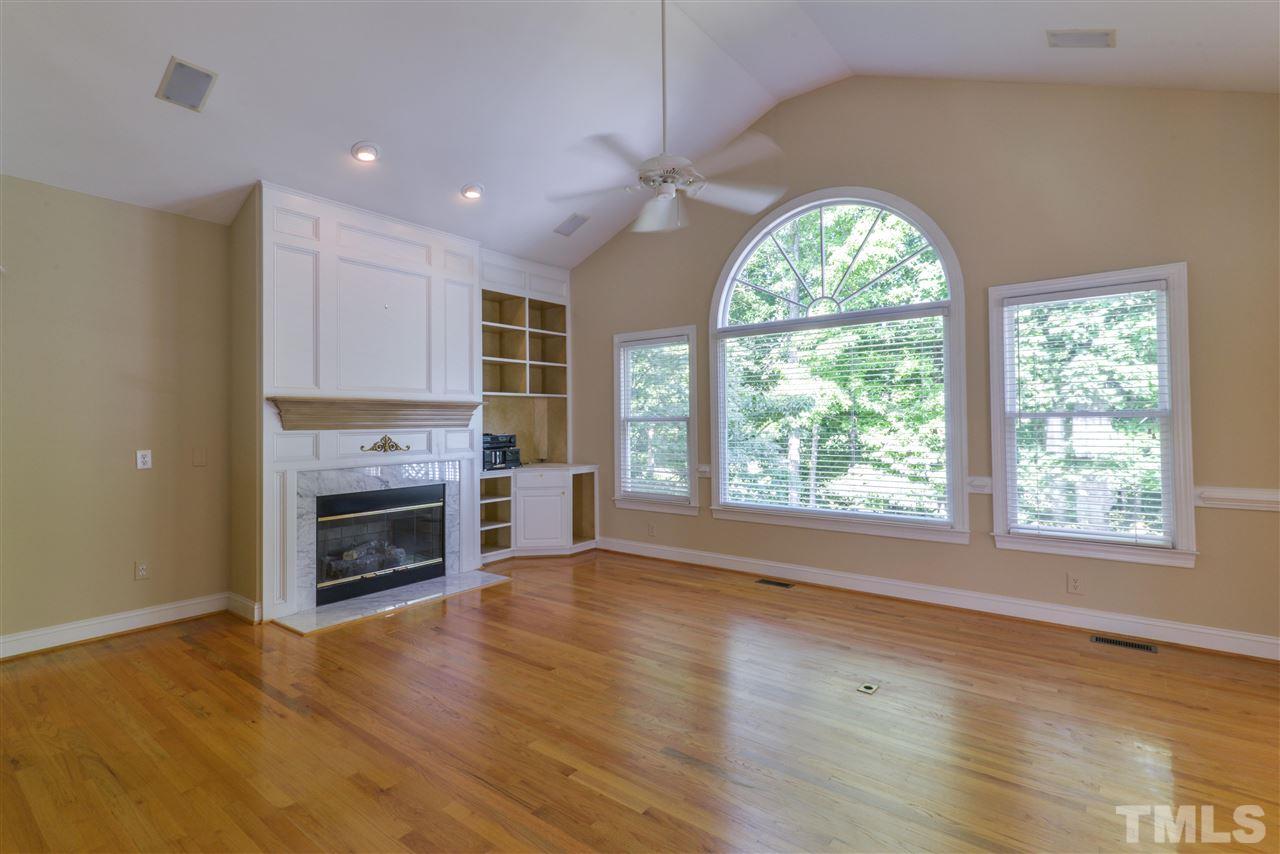 7608 Kelmscot Way Raleigh, NC 27615 - Photo 5 of 23 a view of livingroom with kitchen and window