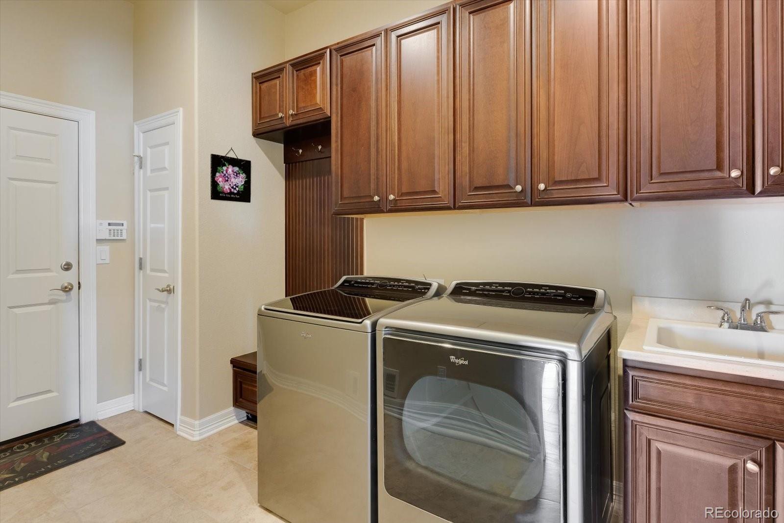 15712 Rito Alto Run Broomfield, CO 80023 - Photo 17 of 26 a utility room with dryer and washer