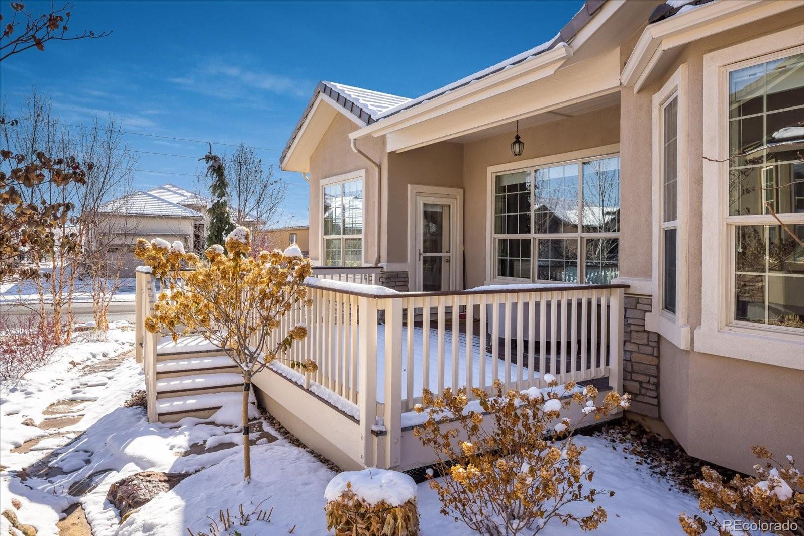 15712 Rito Alto Run Broomfield, CO 80023 - Photo 20 of 26 a view of a porch with a bench