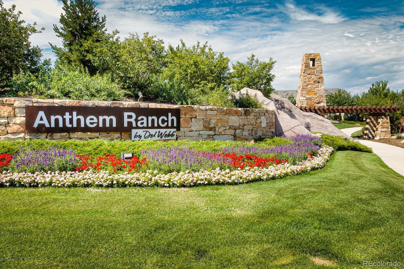 15712 Rito Alto Run Broomfield, CO 80023 - Photo 26 of 26 a view of a sign board with flower garden