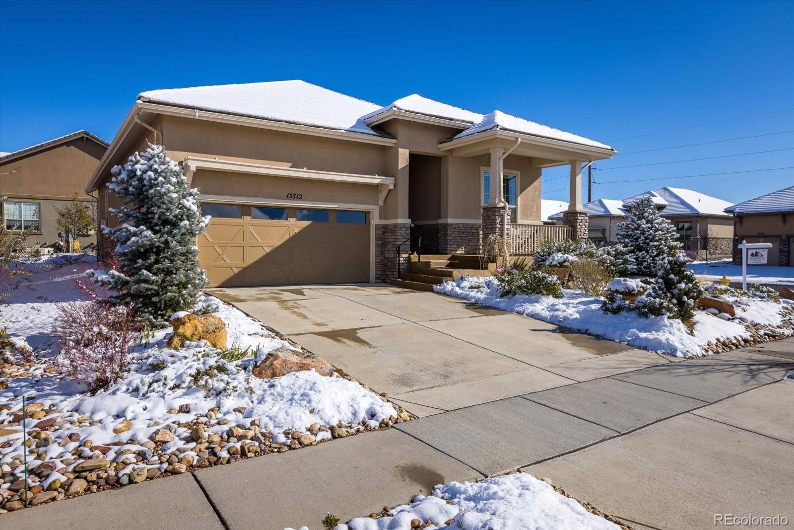 15712 Rito Alto Run Broomfield, CO 80023 - Photo 3 of 26 a front view of a house with a yard