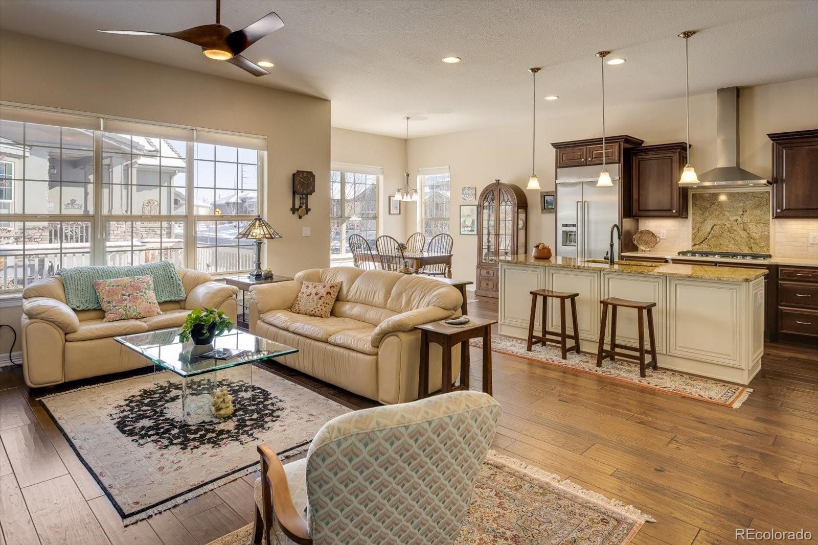 15712 Rito Alto Run Broomfield, CO 80023 - Photo 6 of 26 a living room with furniture and a large window