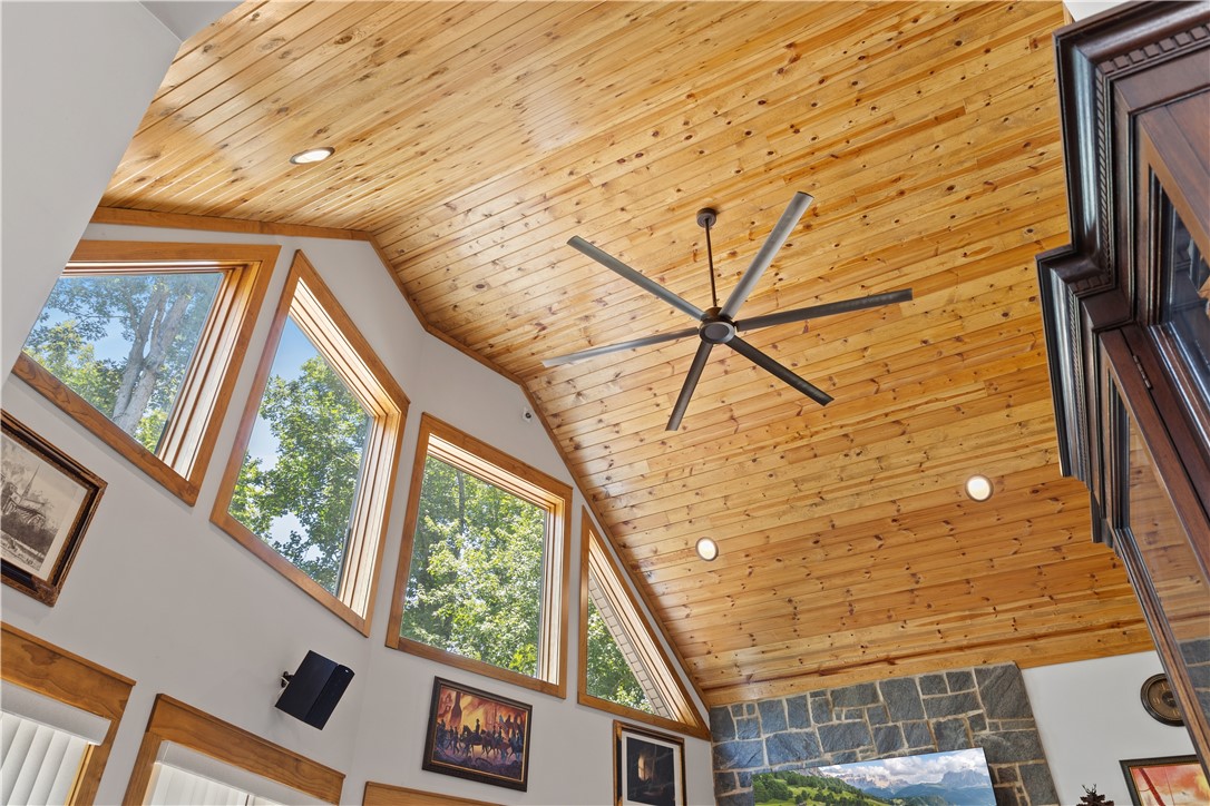 332 Two Rivers Drive Westminster, SC 29693 - Photo 30 of 50 A striking vaulted ceiling with natural wood planks creates an inviting atmosphere.