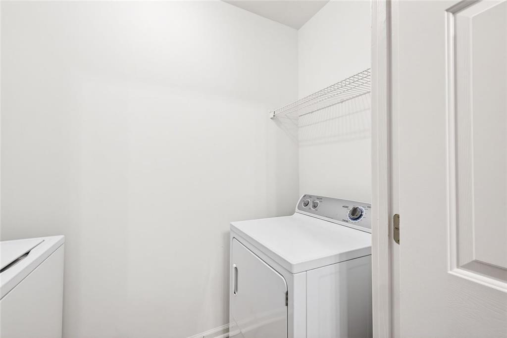 3334 Peachtree Road Northeast, Unit 905 Atlanta, GA 30326 - Photo 16 of 29 a utility room with dryer and washer