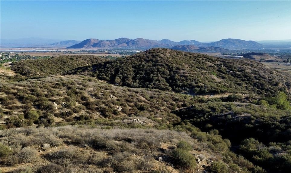 27920 Vista Suelto Road Moreno Valley, CA 92555 - Photo 11 of 16 a view of a house with a mountain