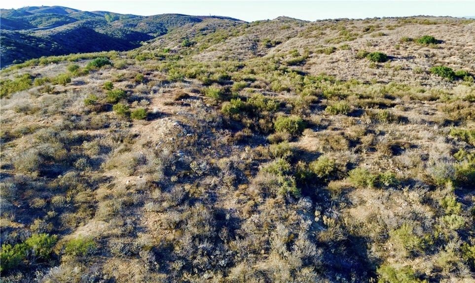 27920 Vista Suelto Road Moreno Valley, CA 92555 - Photo 3 of 16 a view of a field