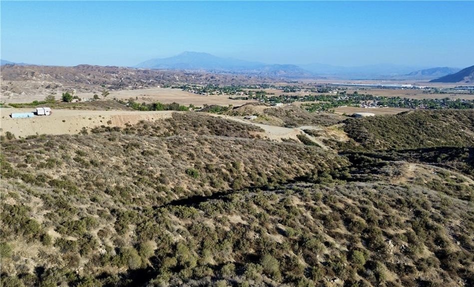27920 Vista Suelto Road Moreno Valley, CA 92555 - Photo 4 of 16 a view of a city with mountains in the background