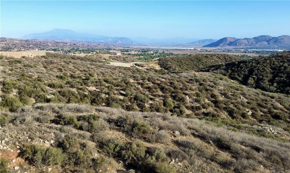 27920 Vista Suelto Road Moreno Valley, CA 92555 - Photo 7 of 16 a view of a city with mountain