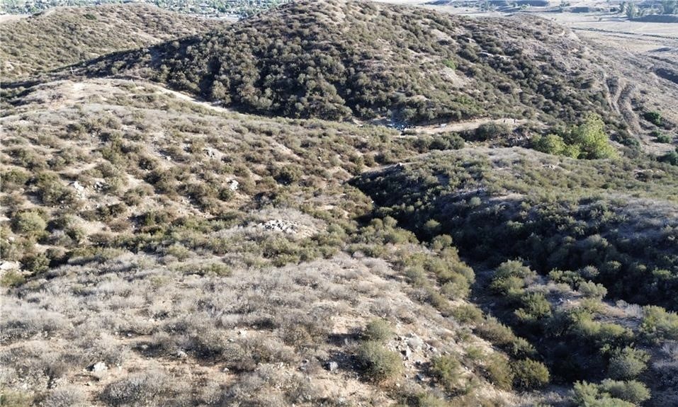 27920 Vista Suelto Road Moreno Valley, CA 92555 - Photo 10 of 16 a view of a yard covered with snow