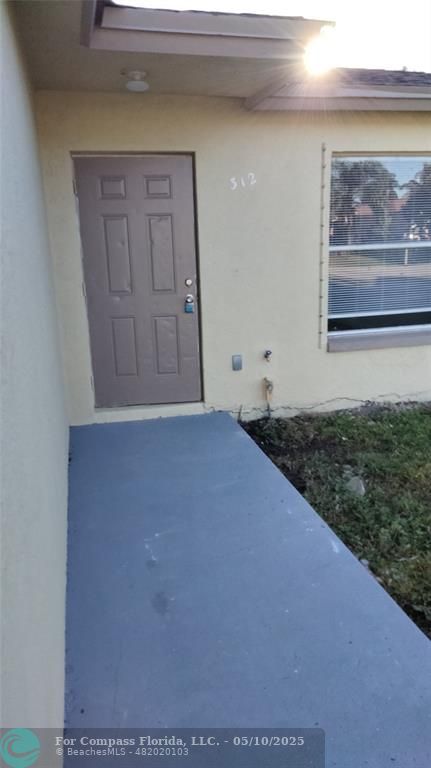 312 Carissa Drive Pahokee, FL 33476 - Photo 12 of 14 a view of an entryway