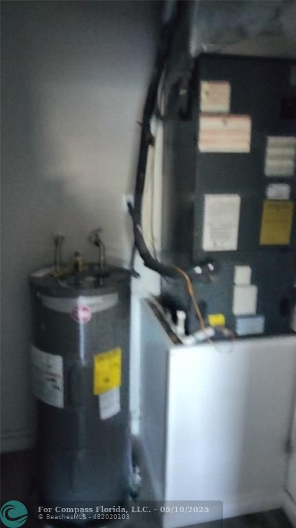 312 Carissa Drive Pahokee, FL 33476 - Photo 13 of 14 a bathroom with a sink and mirror