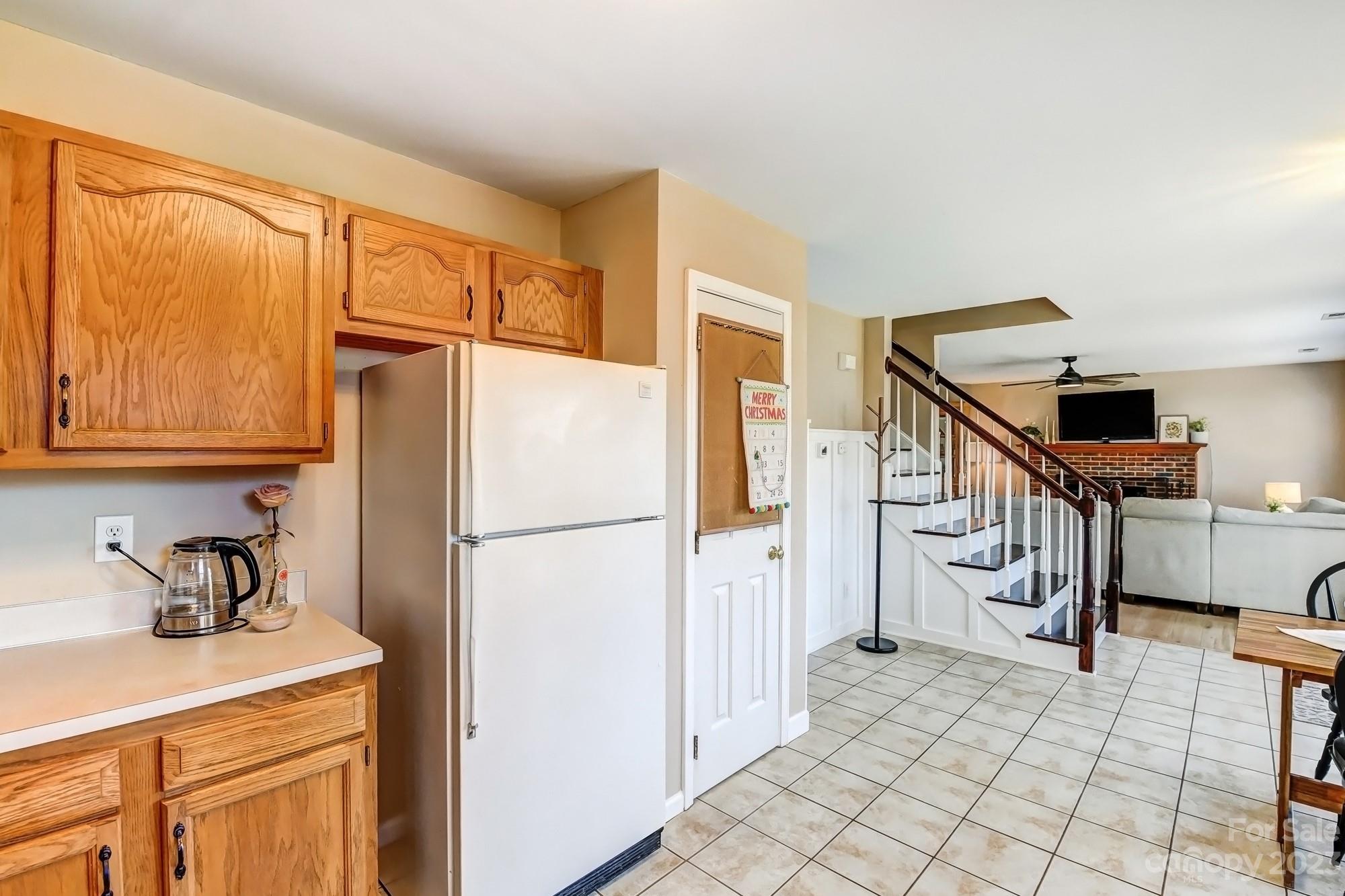 1663 Heather Glen Road Kannapolis, NC 28081 - Photo 12 of 40 a kitchen with stainless steel appliances a refrigerator and a sink