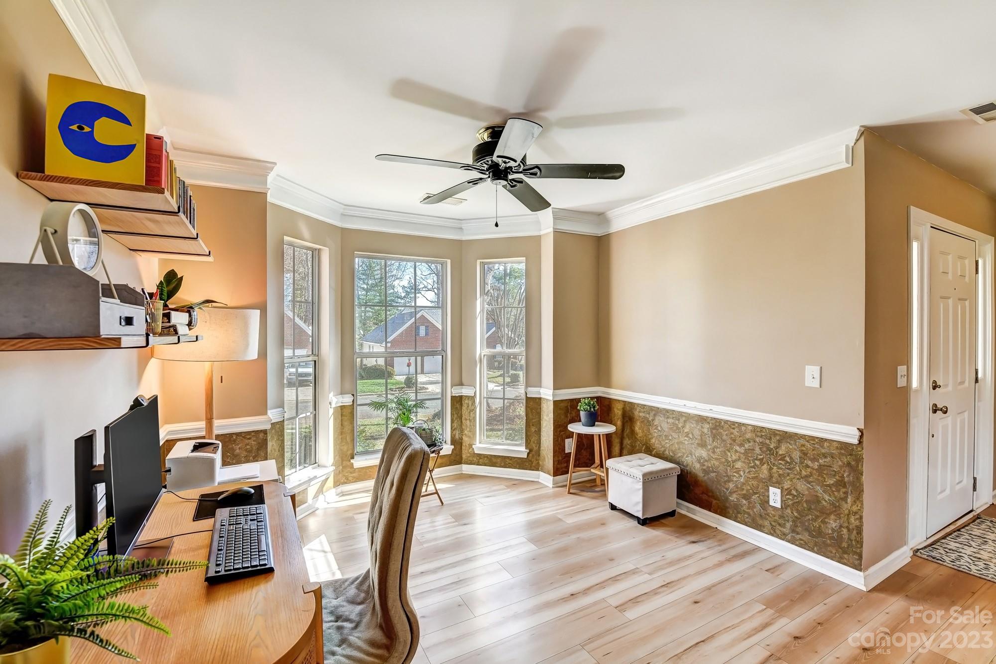 1663 Heather Glen Road Kannapolis, NC 28081 - Photo 15 of 40 a view of a livingroom with furniture window and a ceiling fan