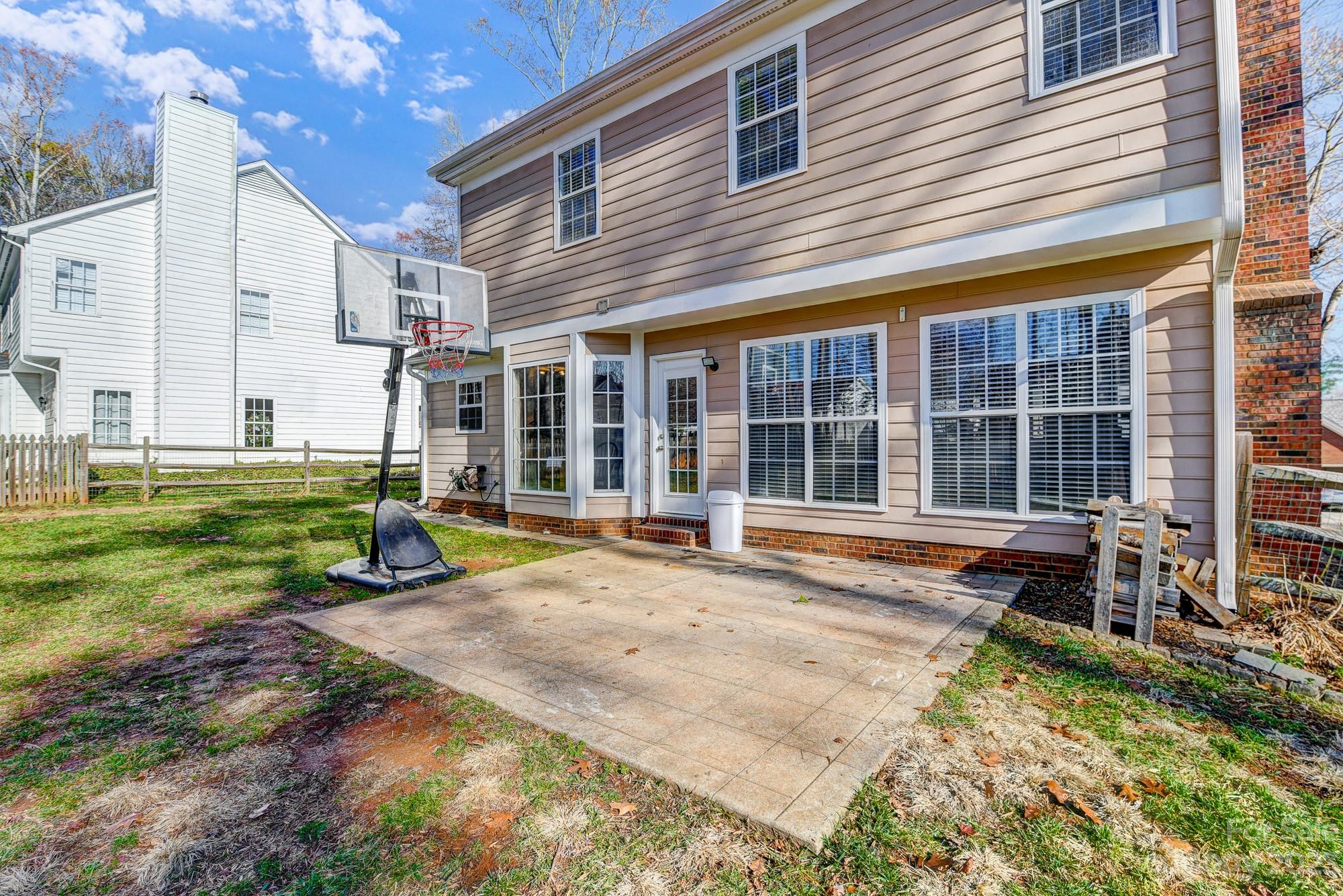 1663 Heather Glen Road Kannapolis, NC 28081 - Photo 34 of 40 a view of a house with backyard and sitting area