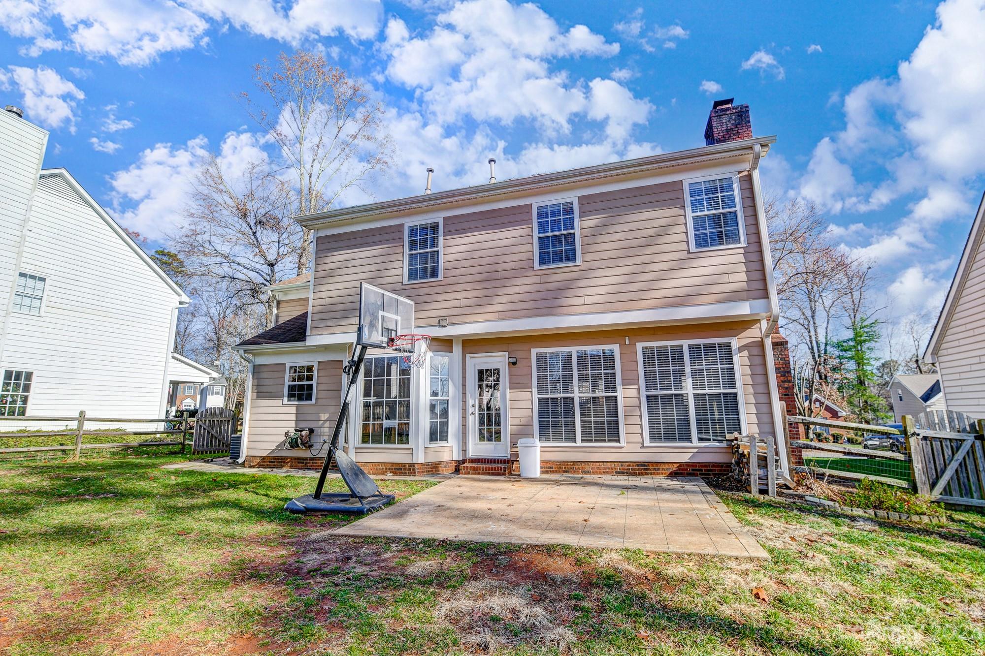 1663 Heather Glen Road Kannapolis, NC 28081 - Photo 35 of 40 a view of a house with backyard porch and sitting area