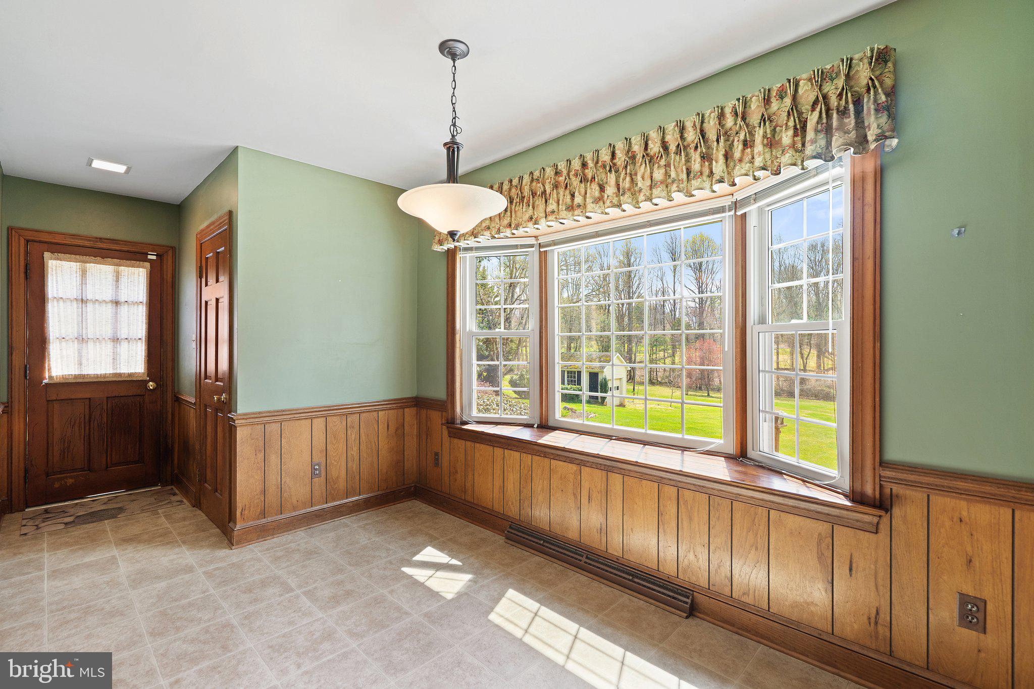 10328 Walker Road Culpeper, VA 22701 - Photo 20 of 79 Well lit breakfast area overlooks back yard