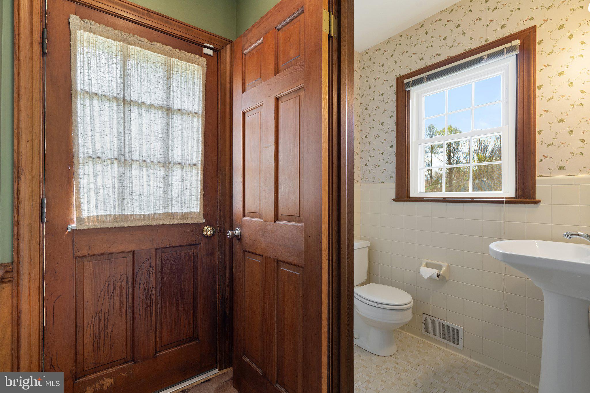 10328 Walker Road Culpeper, VA 22701 - Photo 21 of 79 Half bath close to side entry and laundry