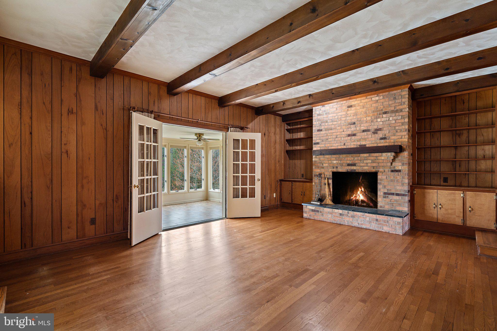 10328 Walker Road Culpeper, VA 22701 - Photo 28 of 79 Family rm, brick fireplace, built-in cabinets