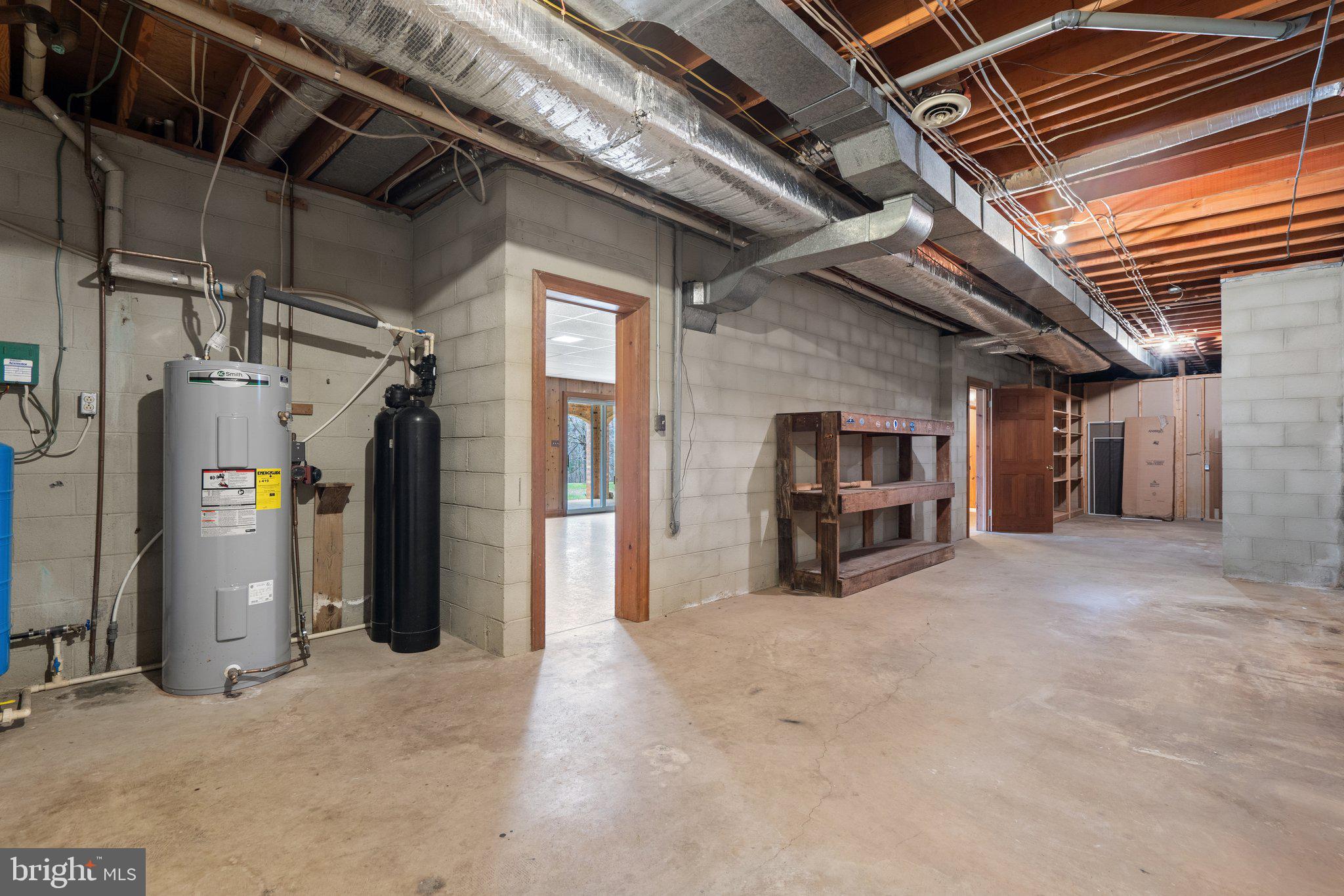 10328 Walker Road Culpeper, VA 22701 - Photo 64 of 79 Basement, water heater, water treatement
