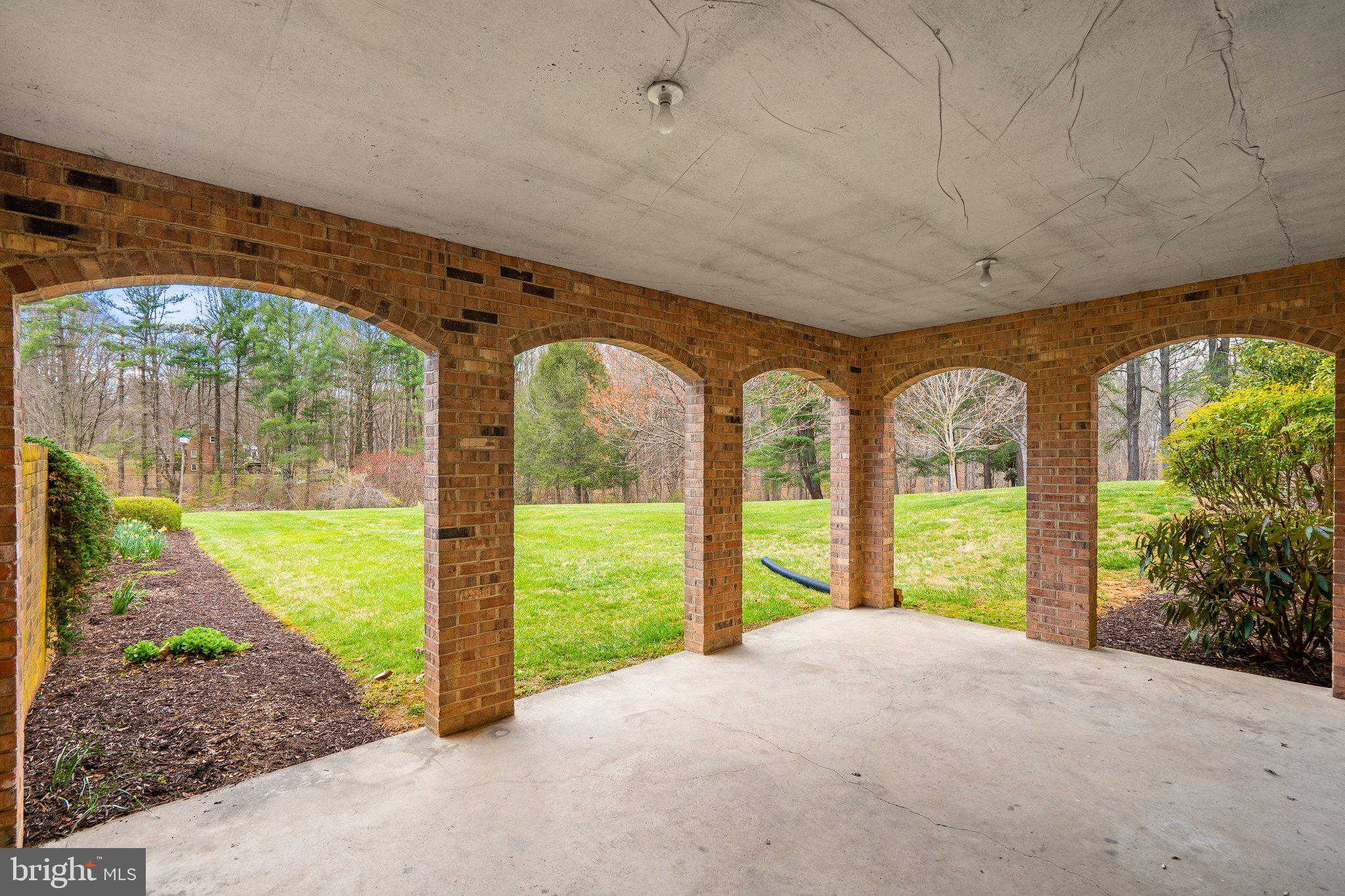 10328 Walker Road Culpeper, VA 22701 - Photo 69 of 79 Patio views framed by brick columns & arches
