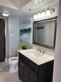 a bathroom with a shower and a shower