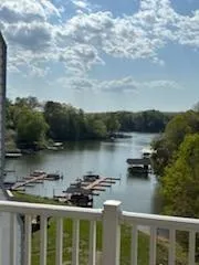 a close view of a refrigerator in kitchen and cabinets