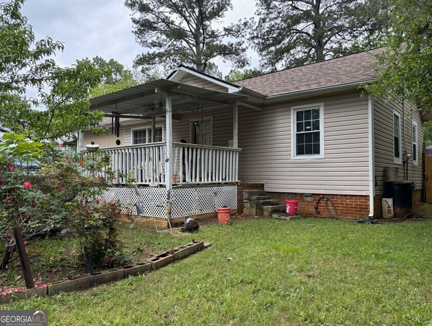 4 Bowen Lane Northwest Rome, GA 30165 - Photo 1 of 1 a view of a house with a yard and sitting area
